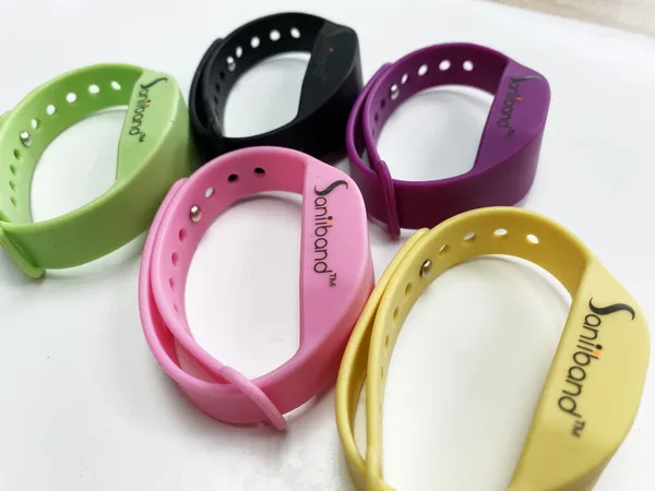 Sanitizer-dispensing wrist band by SaniBand Sanitizer-dispensing wrist band by SaniBand
